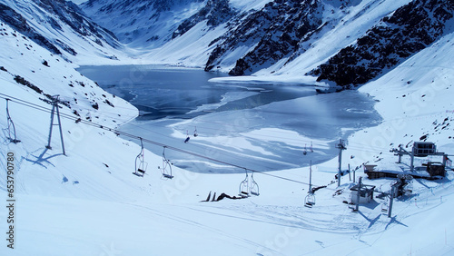 Santiago Chile. Ski station center at snowing Andes Mountains near Santiago Chile. Snow mountain landscape at winterness. Winter ness travel destination. Winter ness tourism travel. photo