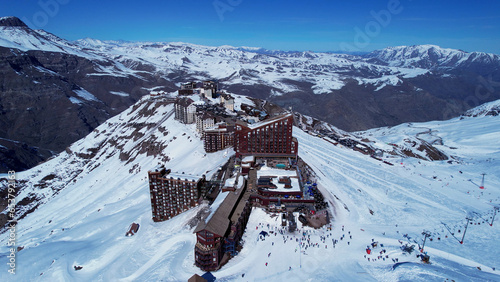 Santiago Chile. Ski station center at snowing Andes Mountains near Santiago Chile. Snow mountain landscape at winterness. Winter ness travel destination. Winter ness tourism travel.
