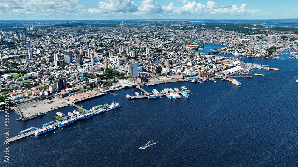 Downtown Manaus Brazil. Capital city of Amazonas State near Amazon river and Amazon forest. Tropical destination. Tropical travel. Tourism landmark.  Outdoors urban scenery downtown Manaus Brazil.