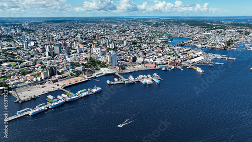 Downtown Manaus Brazil. Capital city of Amazonas State near Amazon river and Amazon forest. Tropical destination. Tropical travel. Tourism landmark.  Outdoors urban scenery downtown Manaus Brazil. photo