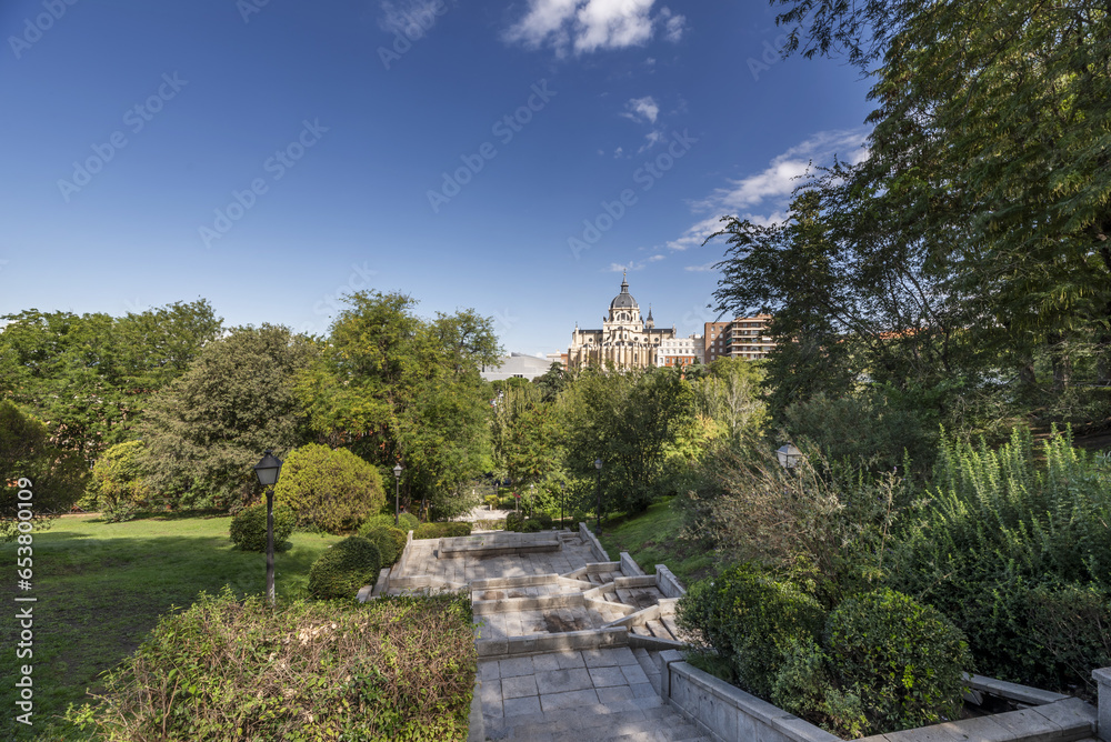 Beautiful granite stairs in an urban park from which you can see the Almudena Cathedral in Madrid. Spain