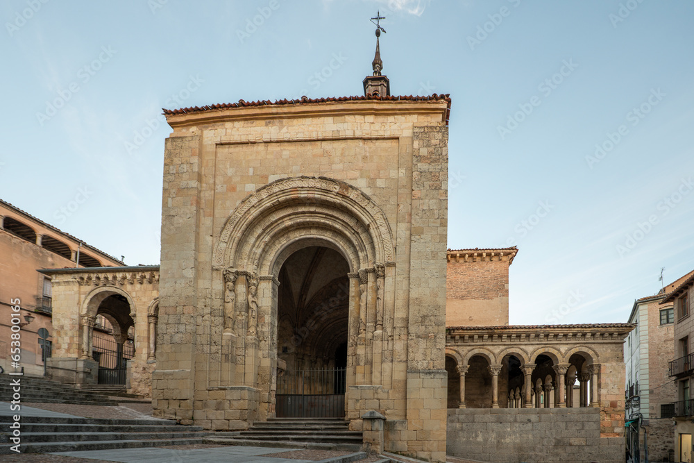 Facade of a vintage Romanesque church in the city of Segovia, Spain