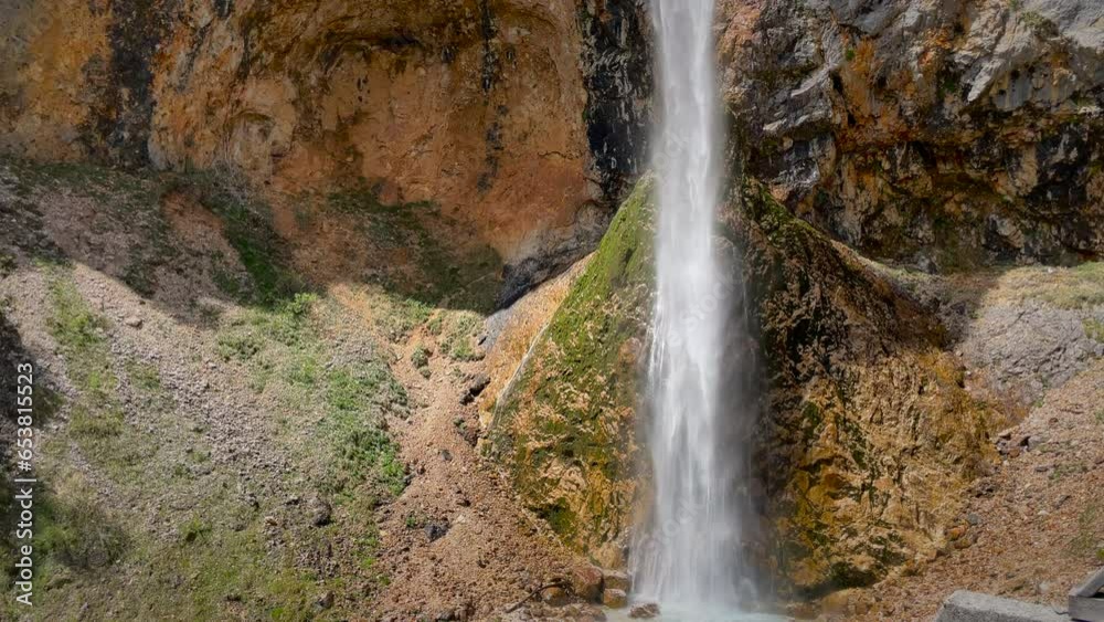 Rinka Falls in the Logar Valley (Logarska dolina) in the Kamnik Savinja Alps in Slovenia during a beautiful springtime day. Rinka Falls in the Logar Valley (Logarska dolina) in the Kamnik Savinja Alps in Slovenia during a beautiful springtime day.