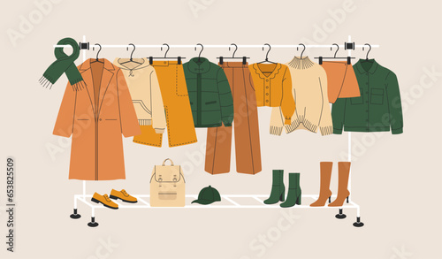 Fashion apparel. Hangers with stylish female clothes, clothing storage, boutique assortment rail, garment holder. Vector cartoon illustration