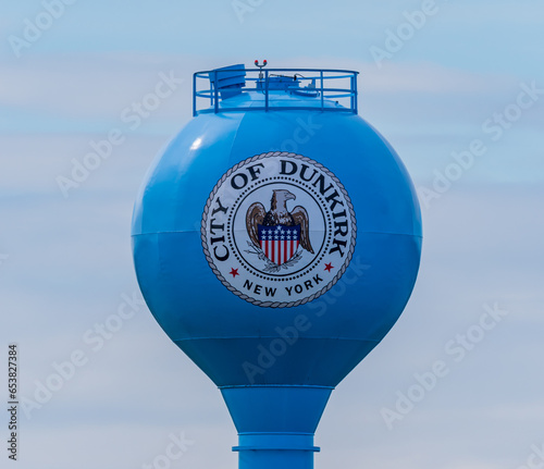 A water tower in the city of Dunkirk, New York, USA on a sunny fall day photo