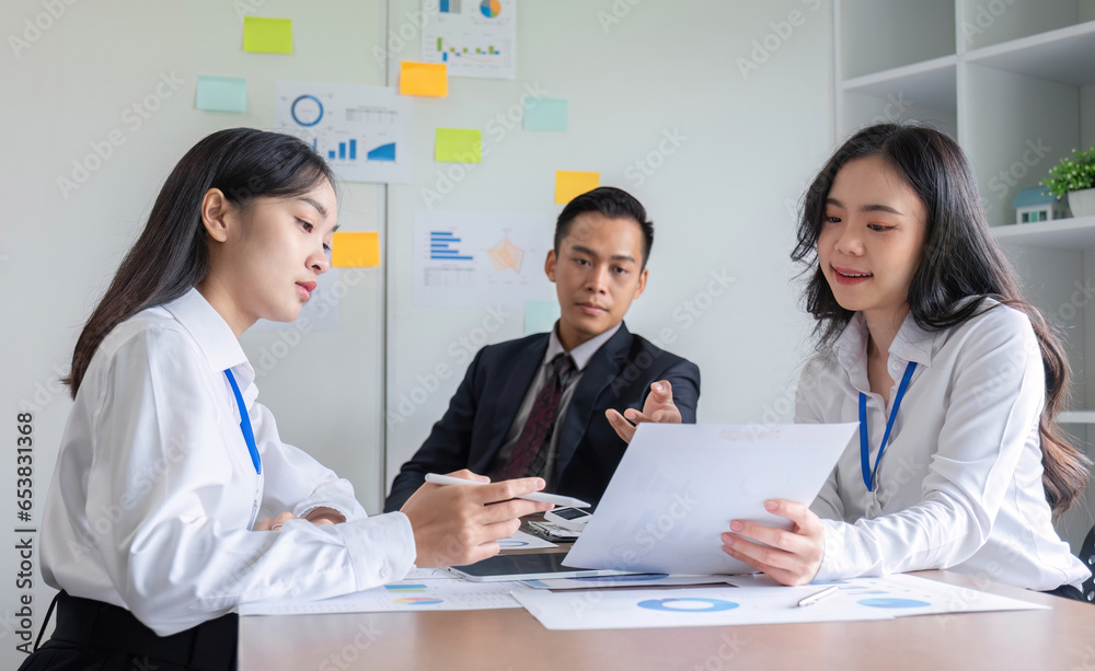 teamwork process Brainstorming ideas for business planning Document and digital work in the company meeting room. teamwork process Brainstorming ideas for business planning Document and digital work in the company meeting room.
