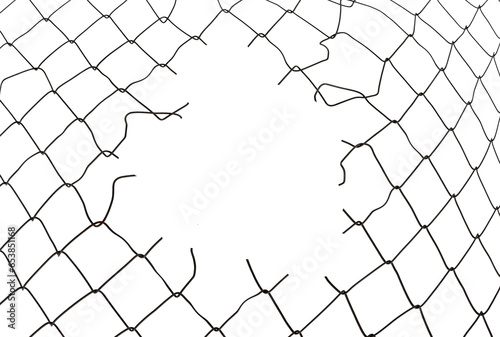 The texture of the metal mesh. Torn  destroyed  broken metal mesh on a white background