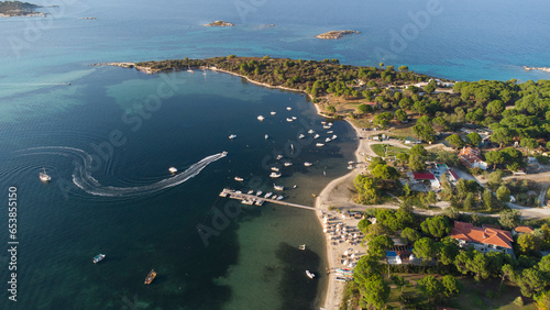 Aerial drone view of iconic paradise bay and twin beaches of Karidi and small Karidi, Vourvourou, Sithonia peninsula, Halkidiki, North Greece photo