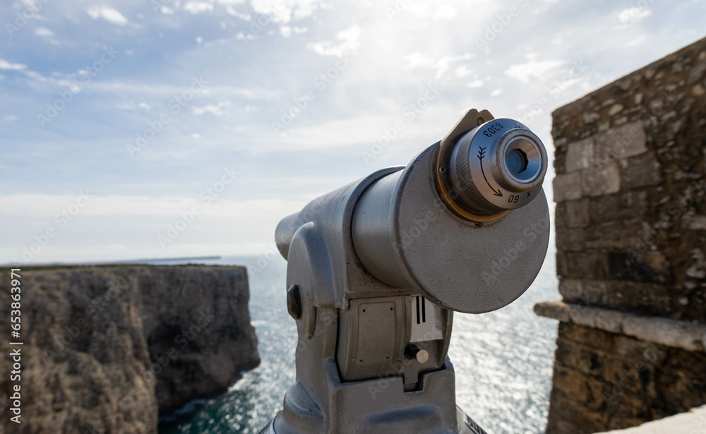 Telescope looking over the cliffs of Cabo de São Vicente, Algarve, Portugal