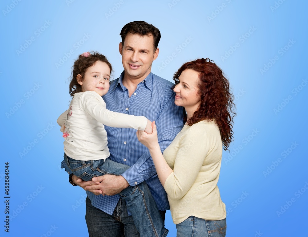 Image of happy young family posing on background Image of happy young family posing on background
