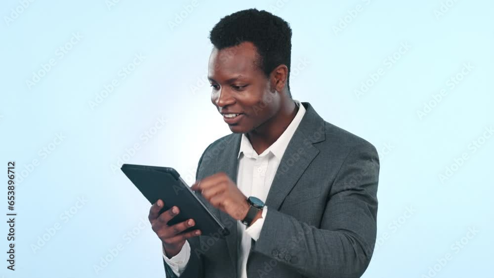 Typing email, reading and a black man with a tablet on a studio background for network or communication. Smile, contact and an African businessman with technology for social media or online chat Typing email, reading and a black man with a tablet on a studio background for network or communication. Smile, contact and an African businessman with technology for social media or online chat