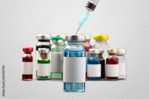 Medical syringe needle with vaccine in doctor's hand