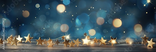 Rozmyte świąteczne tło z gwiazdkami i pięknym bokeh.  © Bear Boy 