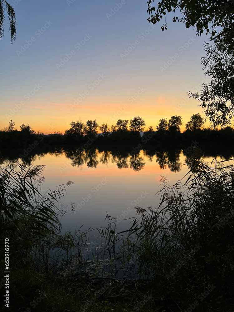 Obraz premium Abendrot See