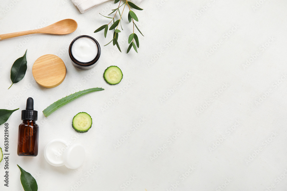 Composition with natural cosmetics and ingredients on light background Composition with natural cosmetics and ingredients on light background