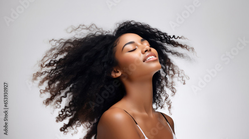 Radiant Afro Beauty: Long, Shiny Curly Hair for Cosmetics Campaigns