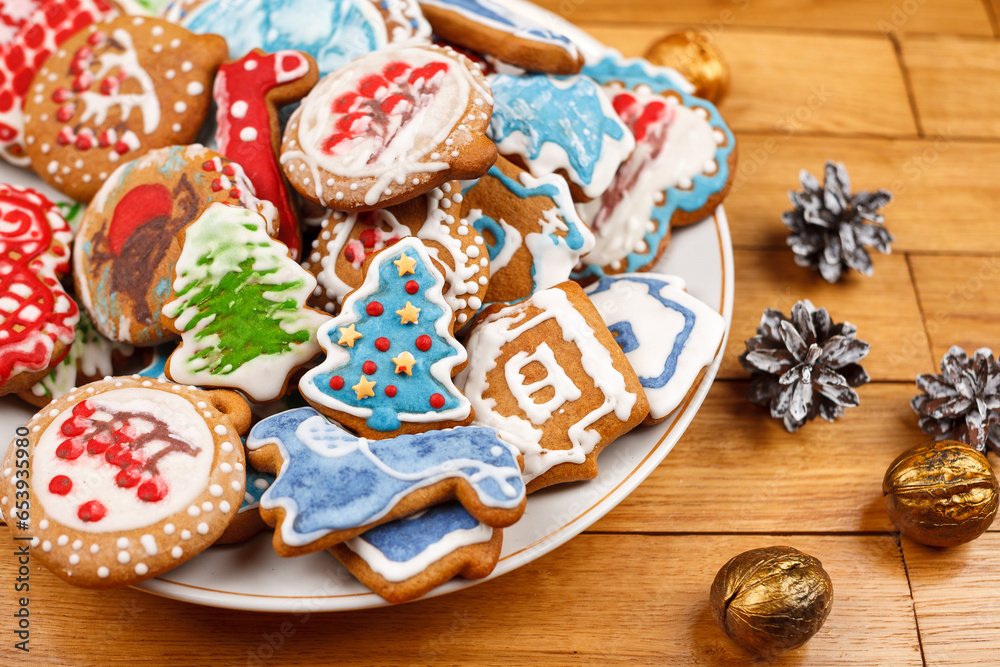 Baked gingerbread christmas decorated in the form of houses christmas trees with stars selective focus close-up