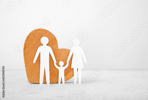 Wooden heart with figures o...
