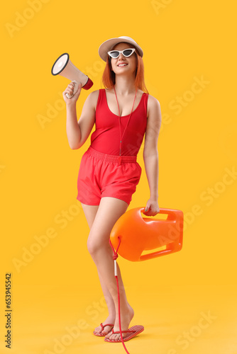 Female lifeguard with rescu...