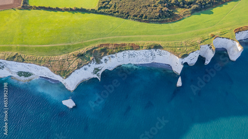 Amazing aerial view of the famous Old Harry Rocks, the most eastern point of the Jurassic Coast, a UNESCO World Heritage Site, UK photo