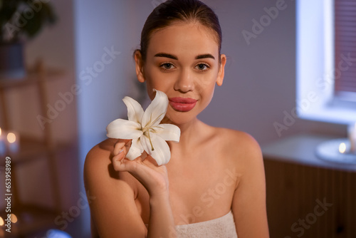 Pretty young woman with lil...