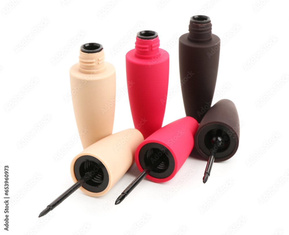 Different stylish eyeliners on white background Different stylish eyeliners on white background