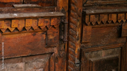 Antique wooden doors carved wood elements. Stock footage. Beautiful wooden doors.