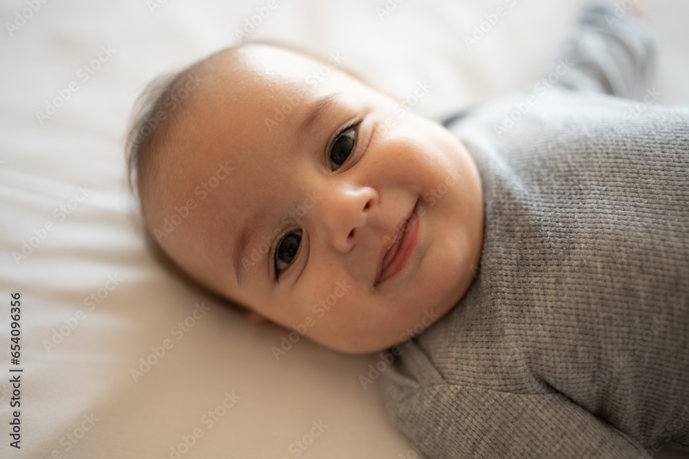 Adorable Baby Sleeping Soundly on Cozy Cushion Adorable Baby Sleeping Soundly on Cozy Cushion