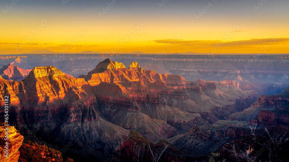 Sunset over the peaks of the Grand Canyon viewed from the terrace of the Lodge on the North Rim of Grand Canyon National Park, Arizona, United States