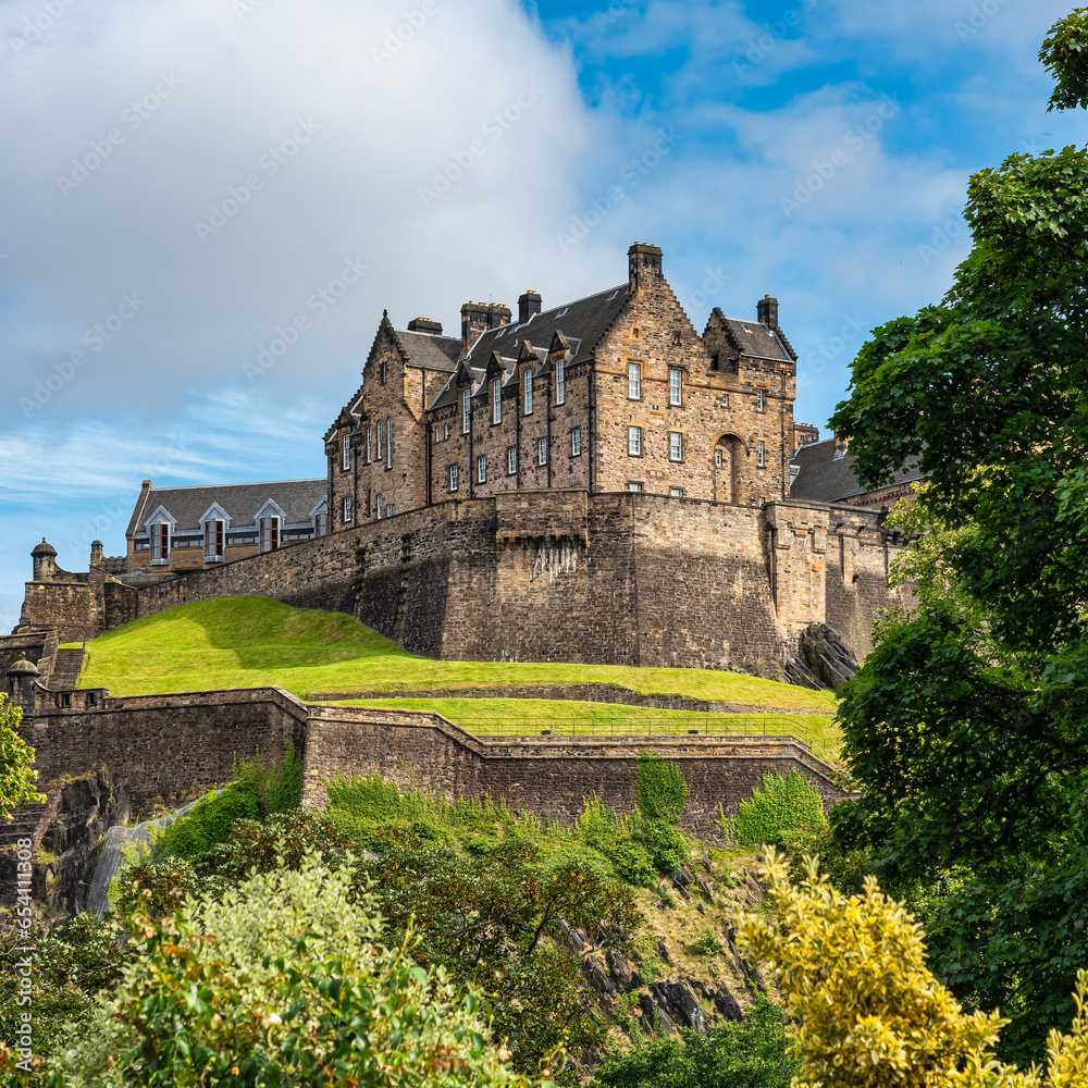 View of Edinburgh Castle from the gardens at the foot of the hill, Scotland, UK.
