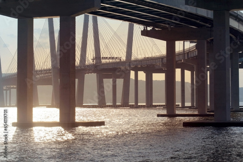 modern bridge crossing water over the hudson river view from under the mario cuomo  tappan zee bridge