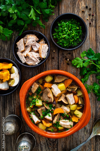 Mushroom soup on wooden table
 photo