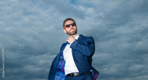 adult carefree business man in suit. photo of carefree business man in suit.