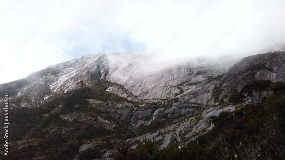 Shot through a window of the peak of Mount Kinabalu, Malaysia, Borneo Shot through a window of the peak of Mount Kinabalu, Malaysia, Borneo