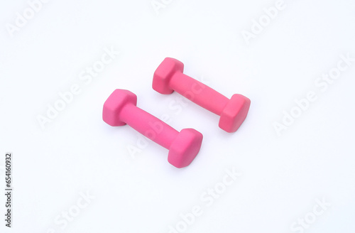 pink rubber dumbbell isolated on white background