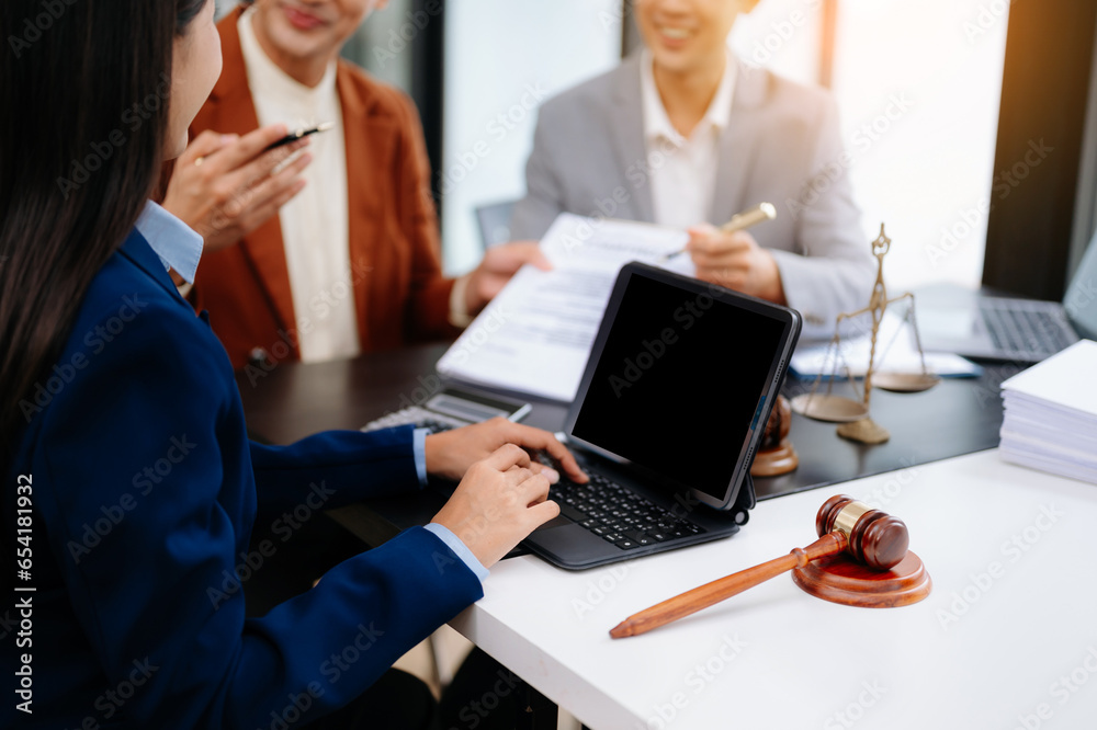 business people and lawyers discussing contract papers sitting at the table. Concepts of law, advice, legal services. in morning light. business people and lawyers discussing contract papers sitting at the table. Concepts of law, advice, legal services. in morning light.
