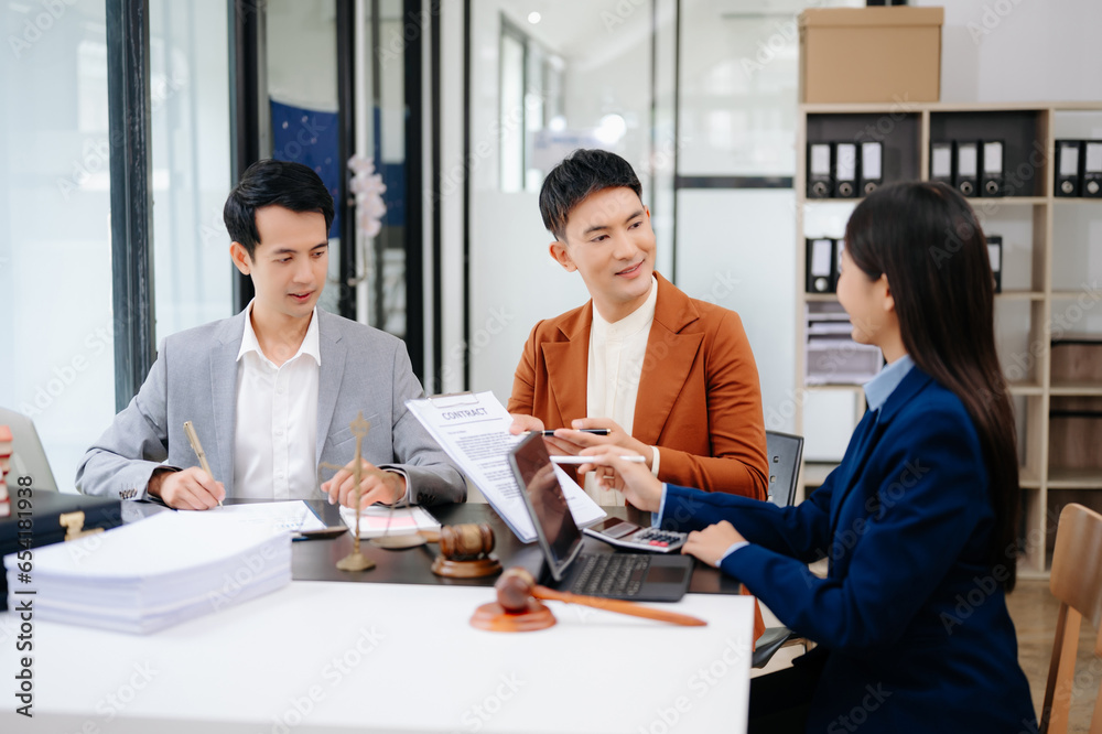 Business and Male lawyer or judge consult having team meeting with client, Law and Legal services concept.Customer service good cooperation in office. Business and Male lawyer or judge consult having team meeting with client, Law and Legal services concept.Customer service good cooperation in office.