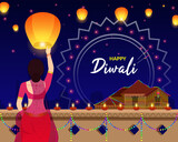 Diwali night sky with illuminated lights and diya. Sky lanterns are floating in the sky.