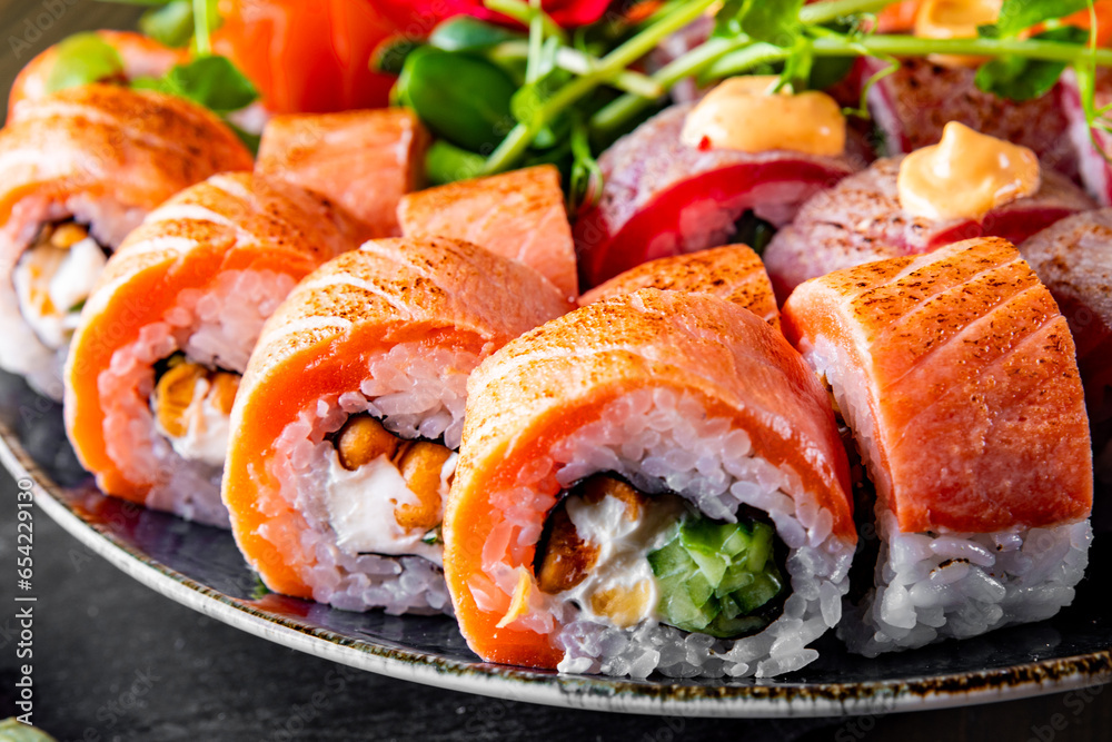 set of sushi roll in plate