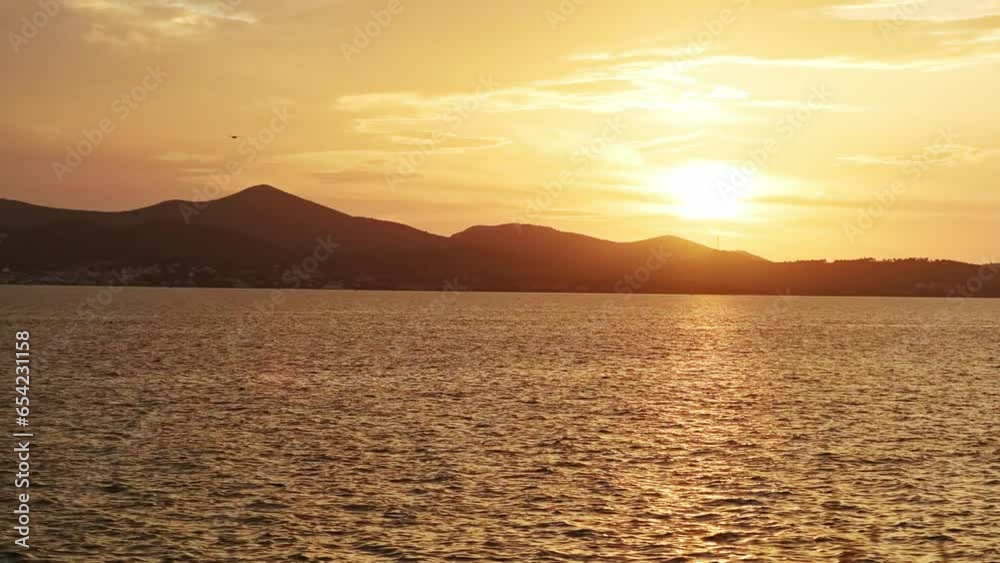 Sailing yacht in the sea at sunset . Sailboat at sunset in the Adriatic Sea, Croatia . Sailing boat at sunset in the Adriatic Sea, Sailing yacht in the sea at sunset . Sailboat at sunset in the Adriatic Sea, Croatia . Sailing boat at sunset in the Adriatic Sea,