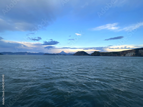 Landscape Long exposure of majestic clouds in the sky sunset or sunrise over sea with reflection in the tropical sea.Beautiful cloudscape scenery.Amazing light of nature Landscape nature background