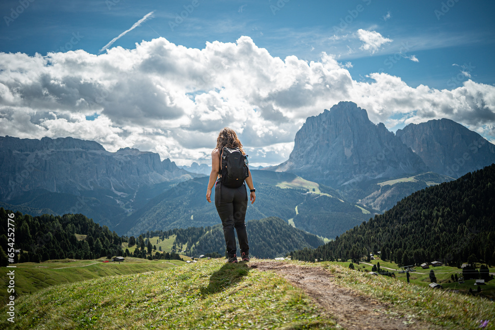 woman in the mountains, cloudy weather , Dolomites, Italy