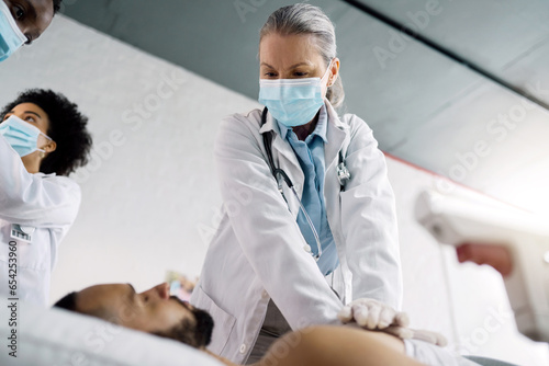 Quadro su tela CPR, emergency and doctor with patient for medical service, first aid and surgery in hospital