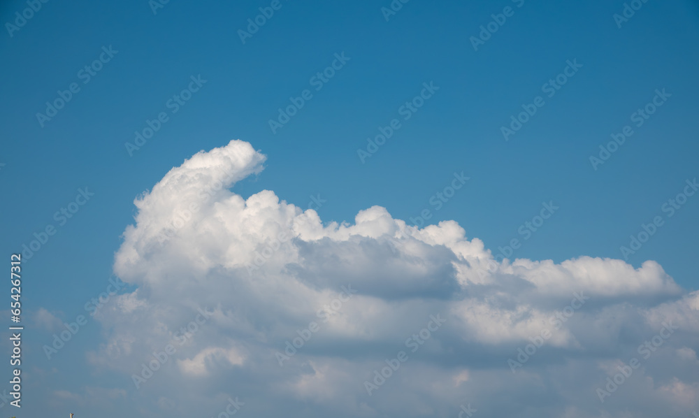 Cumulonimbus calvus, a developing thunderhead cloud. Heavenly clouds sky Cumulonimbus calvus, a developing thunderhead cloud. Heavenly clouds sky