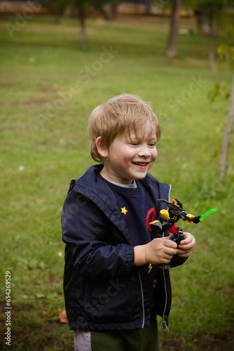 little child playing with toy 