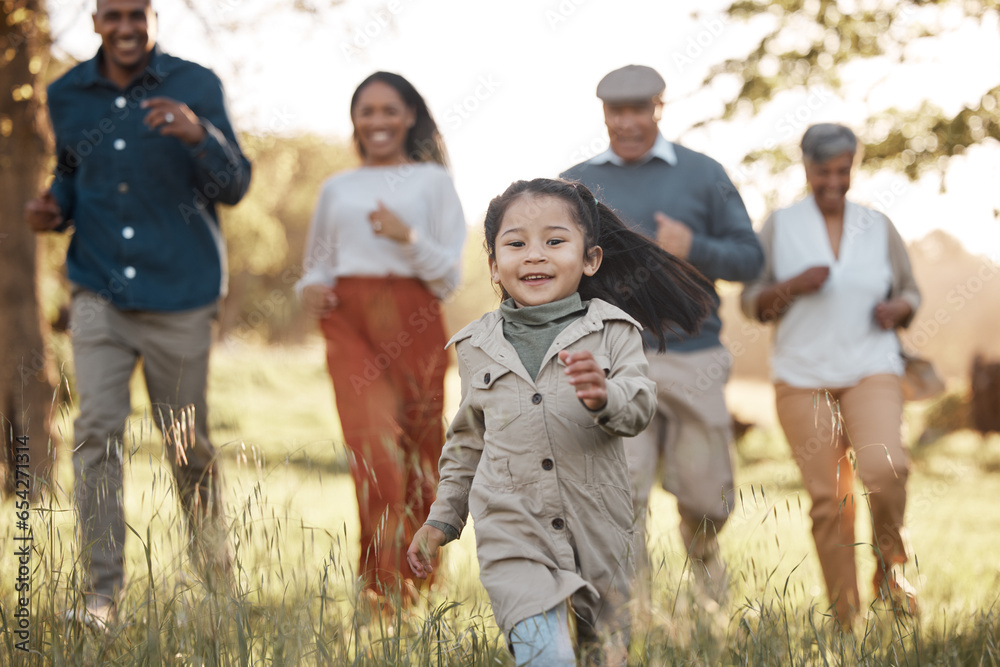Fototapeta premium Park, running and girl with parents or grandparents on grass field for freedom, adventure or playing in summer. Family, men or women with fun or love in forest with sunshine for care or happiness