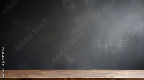 Empty wooden table top with dark concrete wall