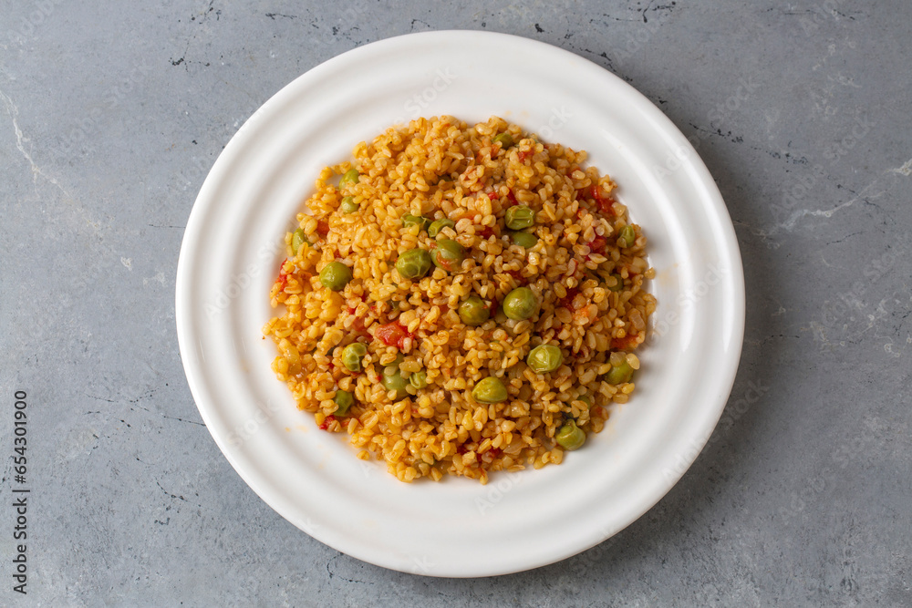 Bulgur pilaf with peas; Turkish name; Bezelyeli bulgur pilavi Bulgur pilaf with peas; Turkish name; Bezelyeli bulgur pilavi