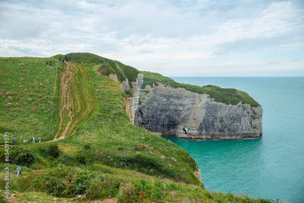 Panoramic view of sea cliff trail in Étretat, France