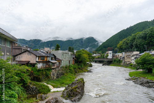 Gujo Hachiman , small riverside castle town during rainy day at Gujo Hachiman Gifu , Japan : 30 August 2019 . © fukez84